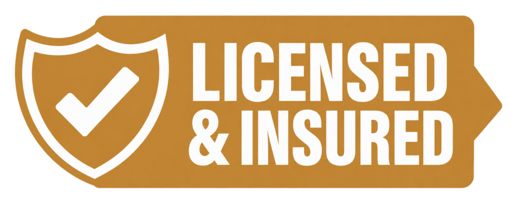 A gold badge with a white checkmark inside a sturdy shield on the left, and bold white lettering on the right reading LICENSED INSURED—just like you’d expect from a contractor who takes pride in quality barndominium builds. - Barndominium Kansas